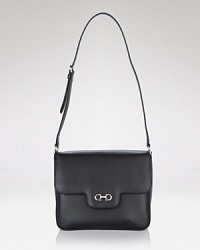 A sleek, chic shoulder bag style in luxe Saffiano leather from Salvatore Ferragamo. A sleek, chic shoulder bag style in luxe Saffiano leather from Salvatore Ferragamo.