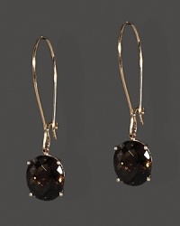 Faceted smoky quartz drop earrings in 14K rose gold settings. Faceted smoky quartz drop earrings in 14K rose gold settings.