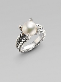 From the Cable Pearl Wrap Collection. A cultured pearl sits nestled among four stunning diamonds atop pillars of sterling silver, on a signature cabled band. 10½mm white cultured freshwater pearl Diamonds, 0.06 tcw Sterling silver Imported From the Cable Pearl Wrap Collection. A cultured pearl sits nestled among four stunning diamonds atop pillars of sterling silver, on a signature cabled band. 10½mm white cultured freshwater pearl Diamonds, 0.06 tcw Sterling silver Imported
