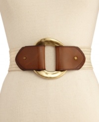 A hammered plaque closure adds textured intrigue to this straw belt from Steve Madden. A hammered plaque closure adds textured intrigue to this straw belt from Steve Madden.