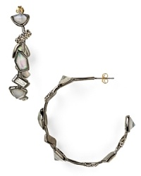 Shape meets sparkle with these crystal and gunmetal hoop earrings from Alexis Bittar. This pair epitomizes the brand's eclectic edge, so wear them to exude downtown cool. Shape meets sparkle with these crystal and gunmetal hoop earrings from Alexis Bittar. This pair epitomizes the brand's eclectic edge, so wear them to exude downtown cool.