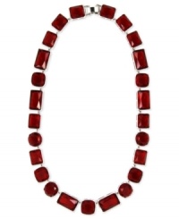 Paint the town red with this statement necklace from Nine West. Crafted from silver-tone mixed metal, the necklace features shapely stones for a stylish touch. Approximate length: 16 inches. Paint the town red with this statement necklace from Nine West. Crafted from silver-tone mixed metal, the necklace features shapely stones for a stylish touch. Approximate length: 16 inches.