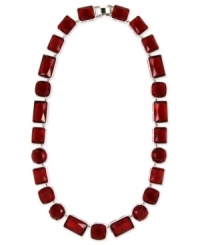 Paint the town red with this statement necklace from Nine West. Crafted from silver-tone mixed metal, the necklace features shapely stones for a stylish touch. Approximate length: 16 inches.