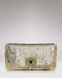 Embroidered sequins are a shining example of statement style on this Overture Judith Leiber leather clutch, which proves party right with its elongated silhouette and optional shoulder strap. Embroidered sequins are a shining example of statement style on this Overture Judith Leiber leather clutch, which proves party right with its elongated silhouette and optional shoulder strap.