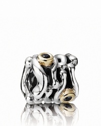 A swirling sterling silver PANDORA charm houses dramatic 14K gold bezel-set black diamonds. A swirling sterling silver PANDORA charm houses dramatic 14K gold bezel-set black diamonds.