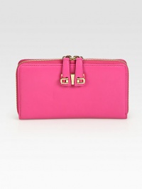 EXCLUSIVELY AT SAKS. Soft Italian leather forms this compact design with gleaming signature hardware. Two-way zip-around closureOne inner zip pocketTwo billfold compartmentsSix credit card slotsFully lined7½W X 4H X ¾DMade in Italy EXCLUSIVELY AT SAKS. Soft Italian leather forms this compact design with gleaming signature hardware. Two-way zip-around closureOne inner zip pocketTwo billfold compartmentsSix credit card slotsFully lined7½W X 4H X ¾DMade in Italy