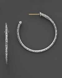 Intricately etched details dress up classic sterling silver hoops. By Konstantino. Intricately etched details dress up classic sterling silver hoops. By Konstantino.