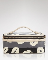 Sealed with a kiss, this MARC BY MARC JACOBS cosmetic case flaunts a puckered up pattern. A leather top handle makes it perfect for travel. Sealed with a kiss, this MARC BY MARC JACOBS cosmetic case flaunts a puckered up pattern. A leather top handle makes it perfect for travel.