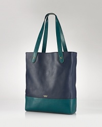 Boldly blocked leather highlights the subtle structure of this Lauren Ralph Lauren handbag. A simple snap secures this piece and opens to a jacquard lined interior with 3 pockets. Boldly blocked leather highlights the subtle structure of this Lauren Ralph Lauren handbag. A simple snap secures this piece and opens to a jacquard lined interior with 3 pockets.
