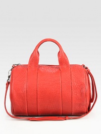 Signature rows of metal feet line the bottom of this versatile carryall, made of rich lambskin leather. Double top handles, 5½ dropAdjustable detachable shoulder strap, 15½-16 dropTop zip closureProtective metal feetOne inside zip pocketTwo inside open pocketsFully lined13½W X 10½H X 4½DImported Signature rows of metal feet line the bottom of this versatile carryall, made of rich lambskin leather. Double top handles, 5½ dropAdjustable detachable shoulder strap, 15½-16 dropTop zip closureProtective metal feetOne inside zip pocketTwo inside open pocketsFully lined13½W X 10½H X 4½DImported