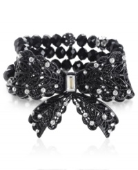 Wrapped up in a pretty package. This stretch bracelet from Betsey Johnson is crafted from black-plated mixed metal in a filigree pattern with rows of beads and glass crystal accents only enhancing the appeal. Approximate length: 7-1/2 inches. Wrapped up in a pretty package. This stretch bracelet from Betsey Johnson is crafted from black-plated mixed metal in a filigree pattern with rows of beads and glass crystal accents only enhancing the appeal. Approximate length: 7-1/2 inches.
