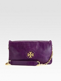 The perfect on-the-go style in luxurious leather with a versatile detachable strap.Detachable chain and leather shoulder strap, 10½ dropMagnetic flap closureTwo inner zip compartmentsCotton lining12½W X 6½H X 1½DImported The perfect on-the-go style in luxurious leather with a versatile detachable strap.Detachable chain and leather shoulder strap, 10½ dropMagnetic flap closureTwo inner zip compartmentsCotton lining12½W X 6½H X 1½DImported