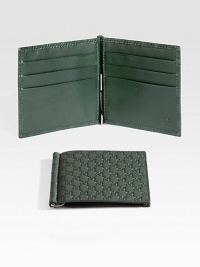 Classic wallet with money clip made of signature microguccisima leather.Six card slotsLeather4W x 4HMade in Italy Classic wallet with money clip made of signature microguccisima leather.Six card slotsLeather4W x 4HMade in Italy
