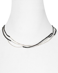 Links of London's triple-strand necklace blends a sterling silver chain with sparkling cotton cord, finished with a toggle closure. Links of London's triple-strand necklace blends a sterling silver chain with sparkling cotton cord, finished with a toggle closure.