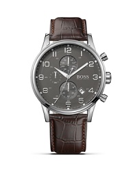 Inspired by elegant and classic aviator chronographs, this stylish HUGO BOSS timepiece boasts chronograph functionality with the possibility to measure intermediate times with tenth of seconds precision. Inspired by elegant and classic aviator chronographs, this stylish HUGO BOSS timepiece boasts chronograph functionality with the possibility to measure intermediate times with tenth of seconds precision.