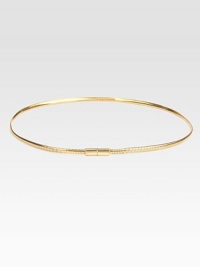 A narrow style in rose goldtone brass with an interlocking push clasp closure. Width, about ¼Made in Italy A narrow style in rose goldtone brass with an interlocking push clasp closure. Width, about ¼Made in Italy
