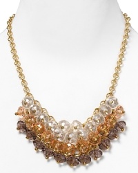 Dreamily stylish with a trio of aqua-hued clustered crystals and gold tone hardware, this cocktail-ready necklace from Aqua is designed to transform every neckline. Dreamily stylish with a trio of aqua-hued clustered crystals and gold tone hardware, this cocktail-ready necklace from Aqua is designed to transform every neckline.
