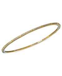 Stack on endless dazzle! This glamorous bangle bracelet from CRISLU is the perfect layering piece with cubic zirconia sparkle (1-1/4 ct. t.w.). Set in 18k gold over sterling silver. Approximate diameter: 2-1/2 inches. Stack on endless dazzle! This glamorous bangle bracelet from CRISLU is the perfect layering piece with cubic zirconia sparkle (1-1/4 ct. t.w.). Set in 18k gold over sterling silver. Approximate diameter: 2-1/2 inches.