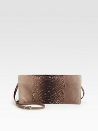 This convenient convertible clutch features a chic python embossed leather body.Detachable adjustable shoulder strap, 15-17 dropSnap button flap closureTwo credit card slotTwo inside open pocketsFully lined11¼W X 5H X 1DMade in Italy This convenient convertible clutch features a chic python embossed leather body.Detachable adjustable shoulder strap, 15-17 dropSnap button flap closureTwo credit card slotTwo inside open pocketsFully lined11¼W X 5H X 1DMade in Italy