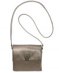 Luxe leather and polished accents give this Calvin Klein design a timelessly posh appeal. Stay organized with this simplistically chic crossbody with classic Calvin detailing. Luxe leather and polished accents give this Calvin Klein design a timelessly posh appeal. Stay organized with this simplistically chic crossbody with classic Calvin detailing.