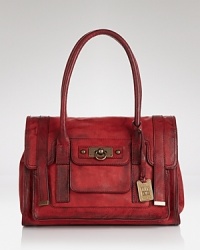 Rugged, all-American style plays muse to this Frye tote, crafted of lived-in leather and designed to be the carryall you throw over the shoulder and take with you on your next adventure. Rugged, all-American style plays muse to this Frye tote, crafted of lived-in leather and designed to be the carryall you throw over the shoulder and take with you on your next adventure.
