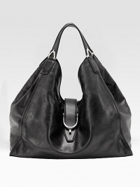 A roomy carryall in luxurious calf leather accented with stirrup-inspired hardware.Double top handles, 8 dropStrap flap closureOne inside zip pocketTwo inside open pocketsSuede lining17W X 14½H X 6DMade in Italy A roomy carryall in luxurious calf leather accented with stirrup-inspired hardware.Double top handles, 8 dropStrap flap closureOne inside zip pocketTwo inside open pocketsSuede lining17W X 14½H X 6DMade in Italy