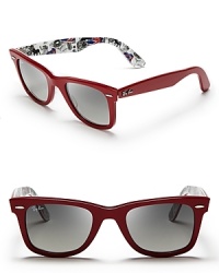These seemingly classic Ray-Ban Wayfarers have a secret party going on; the inside frames feature a fun print with a London motif. These seemingly classic Ray-Ban Wayfarers have a secret party going on; the inside frames feature a fun print with a London motif.