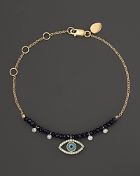 Diamonds and turquoise form a dazzling evil eye on a 14K yellow gold chain. By Meira T. Diamonds and turquoise form a dazzling evil eye on a 14K yellow gold chain. By Meira T.