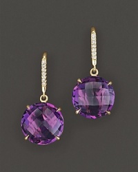 Pavé diamonds and amethyst sparkle in an 18K yellow gold setting. Pavé diamonds and amethyst sparkle in an 18K yellow gold setting.