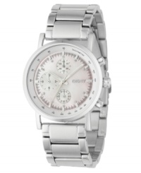 A pretty take on a classic chronograph. Brushed and polished stainless steel bracelet and case. Tachymeter bezel. White mother-of-pearl dial with logo, three subdials and shiny silvertone indexes with twinkling crystals. Three hands. Quartz movement. Water resistant to 50 meters. Two-year limited warranty. A pretty take on a classic chronograph. Brushed and polished stainless steel bracelet and case. Tachymeter bezel. White mother-of-pearl dial with logo, three subdials and shiny silvertone indexes with twinkling crystals. Three hands. Quartz movement. Water resistant to 50 meters. Two-year limited warranty.