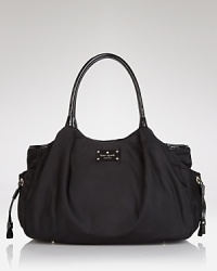 kate spade new york gives the new mom exactly what she wants (and needs): a baby bag that's as chic as it is practical. This carryall boasts pockets for the essentials, a removable changing pad and a shoulder-right size. kate spade new york gives the new mom exactly what she wants (and needs): a baby bag that's as chic as it is practical. This carryall boasts pockets for the essentials, a removable changing pad and a shoulder-right size.