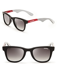 Sporty chic, these Carrera sunglasses race to the fashion finish line with matte back frames and striking red accents. Sporty chic, these Carrera sunglasses race to the fashion finish line with matte back frames and striking red accents.