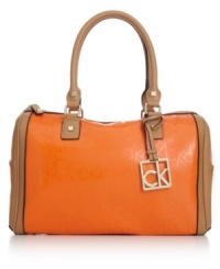 Ladies who lunch know that a chic satchel is an absolute essential, like this posh piece form Calvin Klein. Adorned with the iconic CK monogram and gleaming hardware, its pocket-lined interior stows everything with ease. Ladies who lunch know that a chic satchel is an absolute essential, like this posh piece form Calvin Klein. Adorned with the iconic CK monogram and gleaming hardware, its pocket-lined interior stows everything with ease.