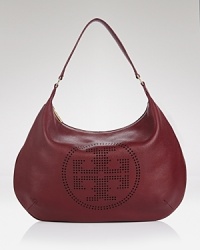 So luxe yet so practical - this Tory Burch hobo brings the best of both with a spacious over the shoulder shape, detailed with a perforated logo. So luxe yet so practical - this Tory Burch hobo brings the best of both with a spacious over the shoulder shape, detailed with a perforated logo.