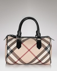 Burberry's iconic check lends luxe style to this classic bowling bag silhouette. Burberry's iconic check lends luxe style to this classic bowling bag silhouette.