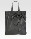 Sumptuous calfskin shaped by an oversized bow for a unique silhouette.Double top handles, 6½ dropTop snap closureInner zip pouchSuede lining13¼W X 15½H X 2DMade in Italy