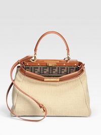 Iconic logo pattern on natural linen, trimmed with soft leather and finished with dual straps for versatility.Leather top handles, 5 drop Detachable adjustable leather shoulder strap, 19-26 drop Double turnlock closure Protective metal feet Split inner compartment One inside zip pocket Fully lined 13W X 10H X 5D Made in Italy Iconic logo pattern on natural linen, trimmed with soft leather and finished with dual straps for versatility.Leather top handles, 5 drop Detachable adjustable leather shoulder strap, 19-26 drop Double turnlock closure Protective metal feet Split inner compartment One inside zip pocket Fully lined 13W X 10H X 5D Made in Italy