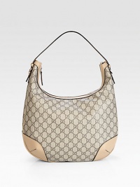 A practical silhouette with an easy carefree feel, this hobo has subtle equestrian inspired detailing and a take-me-anywhere demeanor. A practical silhouette with an easy carefree feel, this hobo has subtle equestrian inspired detailing and a take-me-anywhere demeanor.