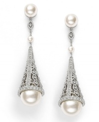 Do elaborate. Add elegance and excellence in Eliot Danori's exquisite cone-shaped crystal-accented drop earrings. Crafted in rhodium-plated mixed metal with simulated pearl drops and simulated pearl accents (4, 8, and 12 mm). Approximate drop: 2-1/4 inches. Do elaborate. Add elegance and excellence in Eliot Danori's exquisite cone-shaped crystal-accented drop earrings. Crafted in rhodium-plated mixed metal with simulated pearl drops and simulated pearl accents (4, 8, and 12 mm). Approximate drop: 2-1/4 inches.