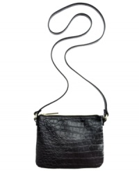 Play up your chic side with this petite design from BCBGeneration that's big on style. Edgy croc-embossed faux leather and signature hardware add some urban cool, while the slender crossbody strap offers instant versatility. Play up your chic side with this petite design from BCBGeneration that's big on style. Edgy croc-embossed faux leather and signature hardware add some urban cool, while the slender crossbody strap offers instant versatility.