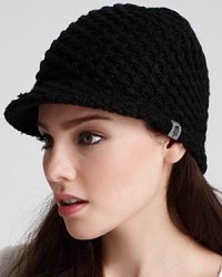 This sporty knit hat with brim is perfect for the slopes on a snowy day. This sporty knit hat with brim is perfect for the slopes on a snowy day.