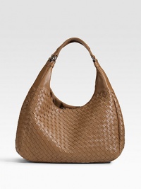 Supple nappa lambskin intricately hand-woven into a classic silhouette, with smooth leather handles.Double top handles, 8 drop Magnetic top closure One inside zip pocket One cellphone pouch One mirror Suede lining 13W X 7½H X 6½D Made in Italy Supple nappa lambskin intricately hand-woven into a classic silhouette, with smooth leather handles.Double top handles, 8 drop Magnetic top closure One inside zip pocket One cellphone pouch One mirror Suede lining 13W X 7½H X 6½D Made in Italy