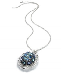 Vintage elegance for every generation. This Bar III necklace highlights a round pendant that glistens with tonal blue acrylic stones. Crafted in antiqued silver tone mixed metal. Approximate length: 30 inches + 2-inch extender. Approximate drop: 2-1/2 inches. Vintage elegance for every generation. This Bar III necklace highlights a round pendant that glistens with tonal blue acrylic stones. Crafted in antiqued silver tone mixed metal. Approximate length: 30 inches + 2-inch extender. Approximate drop: 2-1/2 inches.
