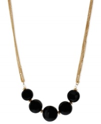 Black isn't back, but rather it's front and center in this frontal necklace from Kenneth Cole New York. Suspended from chains crafted from gold-tone mixed metal are black semi-precious beads. Glass pave accents add luster. Approximate length: 16 inches + 3-inch extender. Approximate drop: 3/4 inch. Black isn't back, but rather it's front and center in this frontal necklace from Kenneth Cole New York. Suspended from chains crafted from gold-tone mixed metal are black semi-precious beads. Glass pave accents add luster. Approximate length: 16 inches + 3-inch extender. Approximate drop: 3/4 inch.