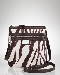 Hit print with this nylon crossbody bag from Lauren Ralph Lauren, boasting bold stripes, leather finishes and a just right size. Hit print with this nylon crossbody bag from Lauren Ralph Lauren, boasting bold stripes, leather finishes and a just right size.