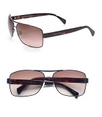 Stylish metal frames and a temple logo detail give these navigators a sophisticated edge.Metal frames with plastic templesBrown polarized lens100% UV protectiveMade in Italy