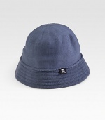 A soft cotton knit design with a bell silhouette and a ribbed brim. Hand wash Imported