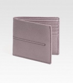 Simple stitch detail accents this handsomely crafted, lightly textured leather design.Two bill compartmentsEight card slotsLeather4¼W x 3¾HMade in Italy