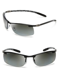 Fast track these Ray-Ban sunglasses with loads of sporty, performance details: ultra-light frames and form-fitting rubberized ear pieces. Fast track these Ray-Ban sunglasses with loads of sporty, performance details: ultra-light frames and form-fitting rubberized ear pieces.
