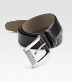 A smooth leather dress style finished with a polished brass buckle. About 1¼ wide Made in Italy 